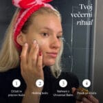 a woman applying cream on her face